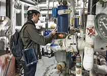 RAND employees doing and energy audit.