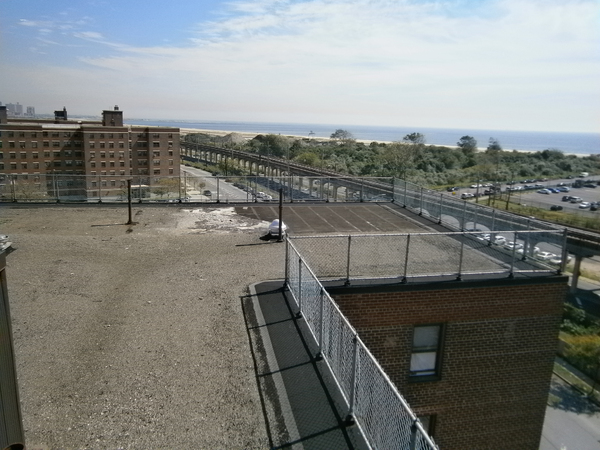 Before photo of the roof before roof and railing replacement