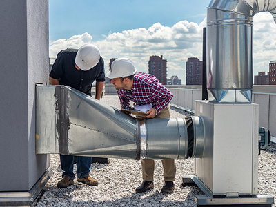 RAND architect and project engineer conducting a forensic survey.
