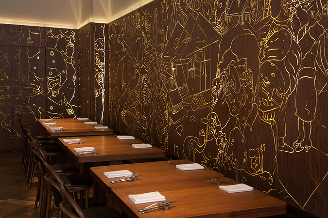 tables and backlit wall panels