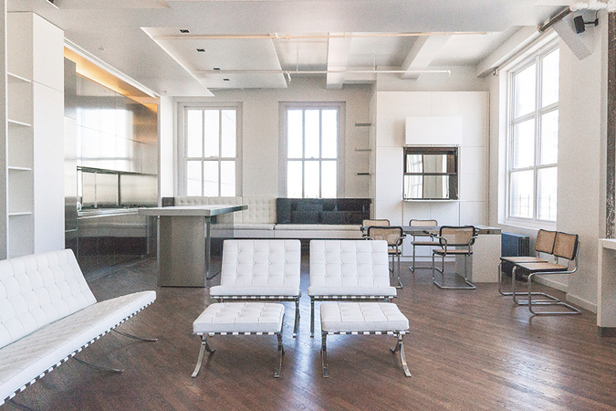 Complete apartment renovation: view of living room and kitchenette.